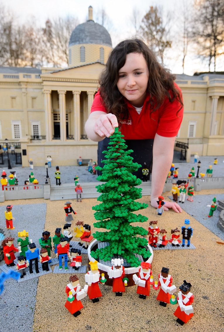 LEGOLAND® model maker Amanda Green puts the finishing touches to the LEGO recreation of the Trafalgar Square Christmas tree.